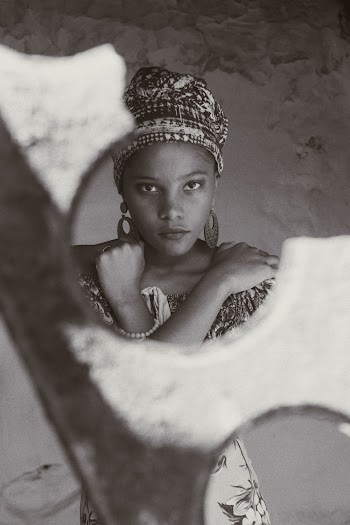 Grayscale Photo of Woman Wearing Dangling Earrings