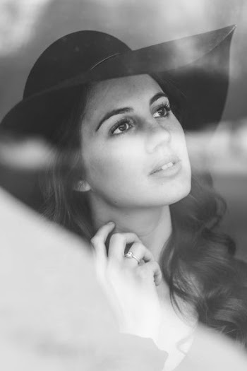 grayscale photo of woman wearing sunhat