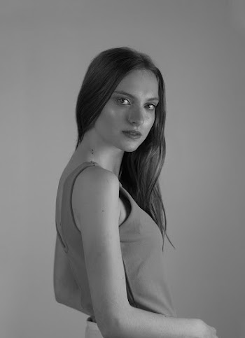 Grayscale Photo of Woman Wearing Tank Top