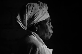 grayscale photo of woman wearing white turban
