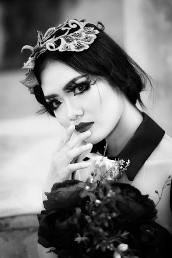 Grayscale Photo of Woman With Flowers