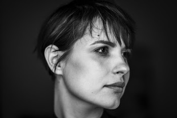 Grayscale Photo of Woman With Short Hair