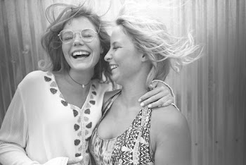 Grayscale Photo of Women Laughing With Their Eyes Closed