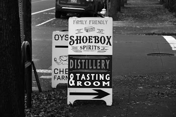 Grayscale Photo Og Shoebox Spirits Signage