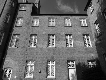Grayscale Photography of 3-storey Building