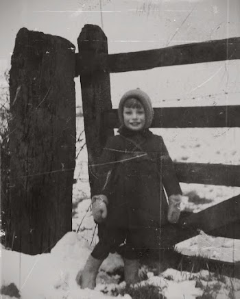 Grayscale Photography Of A Child In Winter