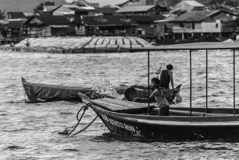 Grayscale Photography of A Girl And A Man  In A Boat