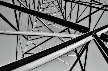 Grayscale Photography Of A Steel Tower