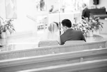 Grayscale Photography of Bride and Groom Sitting
