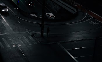 Grayscale Photography of Car Parking Near Road