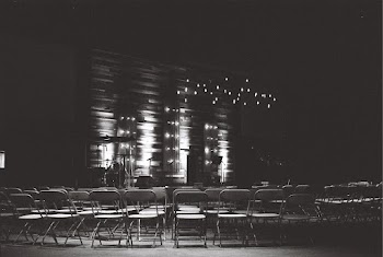 Grayscale Photography Of Chairs In An Auditorium