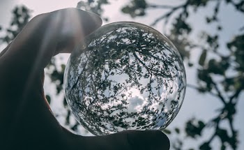 Grayscale Photography of Clear Glass Ball
