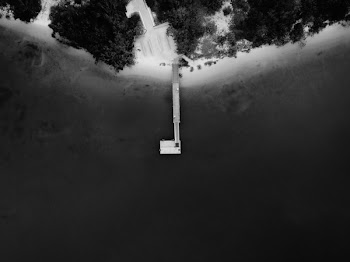 Grayscale Photography of Fishing Dock