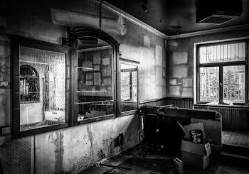 Grayscale Photography of Framed Mirror Inside of Room