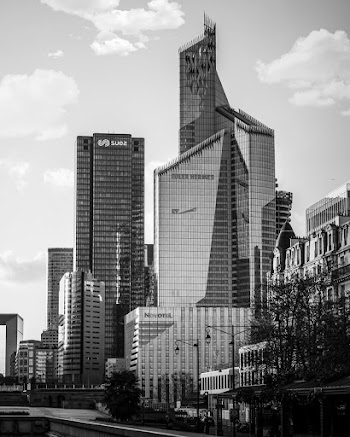 Grayscale Photography of High-rise Buildings