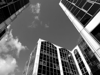 Grayscale Photography of High-rise Buildings
