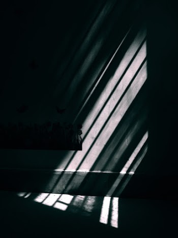 Grayscale Photography of Light on Wall and Floor