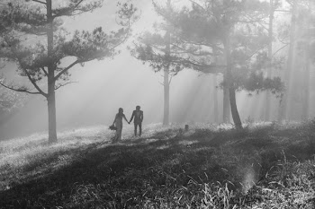 Grayscale Photography of Man and Woman Holding Hands