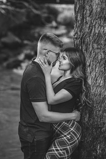 Grayscale Photography of Man and Woman Looking at Each Other