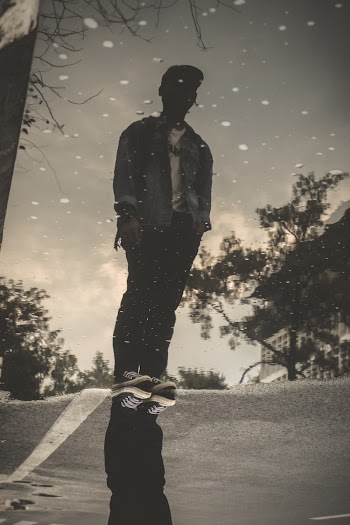 Grayscale Photography of Man in Blue Dress Shirt