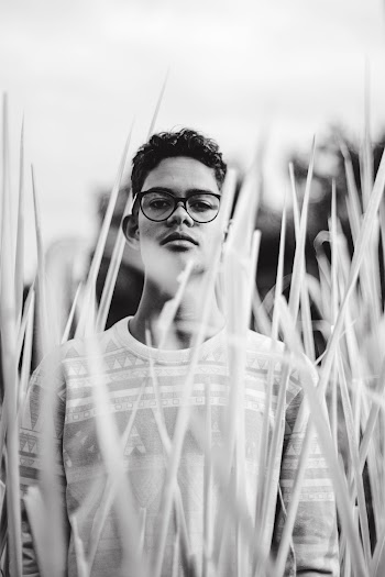 Grayscale Photography of Man in Eyeglasses