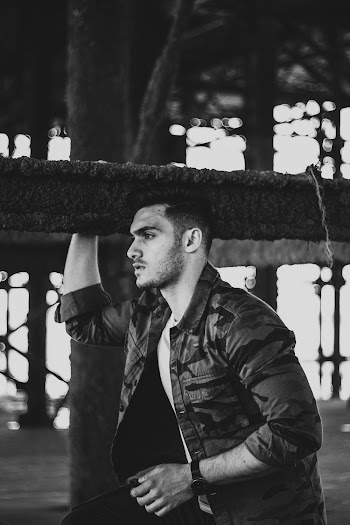Grayscale Photography of Man in Jacket