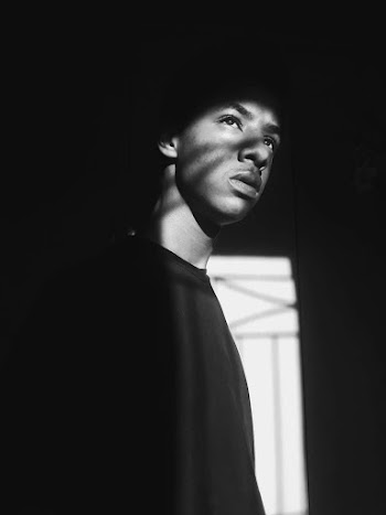Grayscale Photography of Man Looking Up