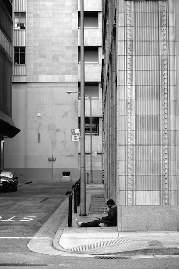 Grayscale Photography of Man on Pavement