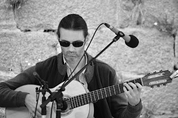 Grayscale Photography of Man Playing Guitar