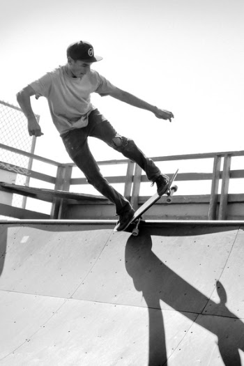 Grayscale Photography of Man Skateboarding on Ramp