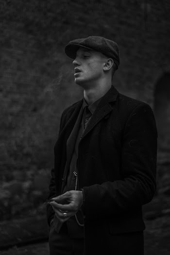 Grayscale Photography of Man Smoking Outdoors