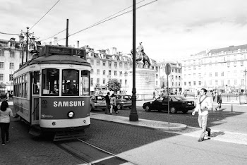 Grayscale Photography of Man Walking Outdoors