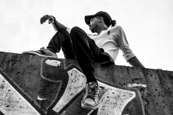 Grayscale Photography of Man Wearing Long-sleeved Shirt