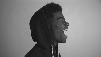 grayscale photography of man wearing pullover hoodie