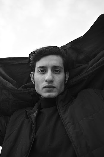 Grayscale Photography of Man Wearing Zip-up Jacket