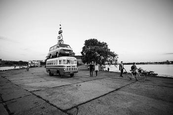 Grayscale Photography of People at Asphalt Road With Cars