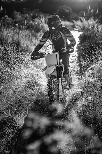 Grayscale Photography of Person Riding Motorcycle