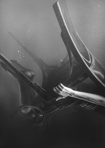 grayscale photography of person sits illustration