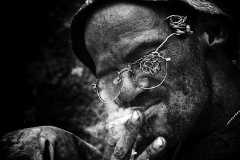 grayscale photography of person smoking