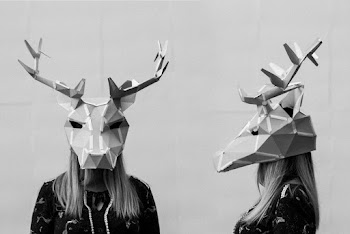 Grayscale Photography Of Person Wearing Deer Mask