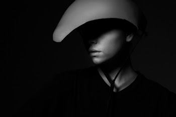 Grayscale Photography of Person Wearing Hat