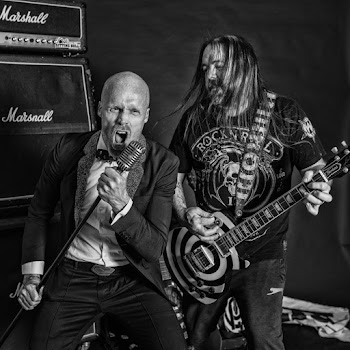 Grayscale Photography Of Rock And Roll Performers
