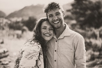 Grayscale Photography of Smiling Couple