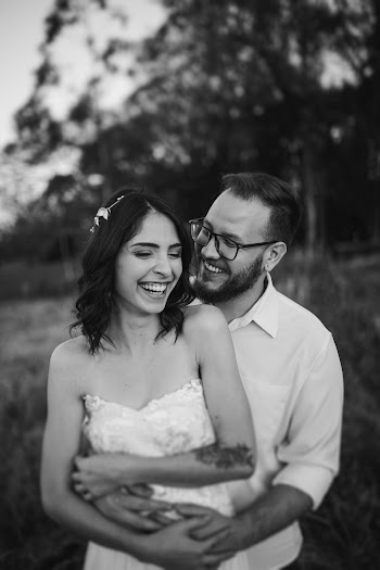 Grayscale Photography of Smiling Man Back Hugging Smiling Woman