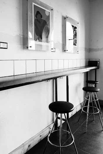 Grayscale Photography of Stools