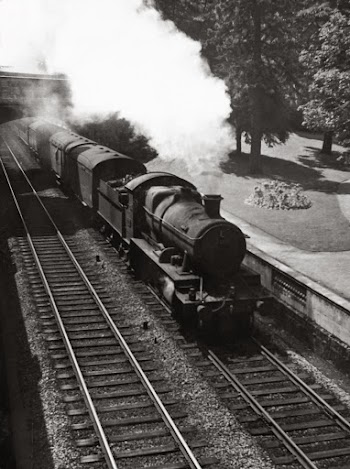 Grayscale Photography of Train on Railroad