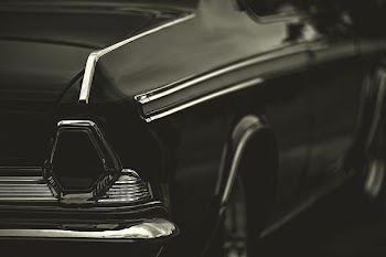 grayscale photography of vehicle