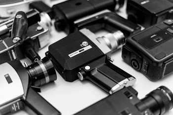 Grayscale Photography of Vintage Camera Lot