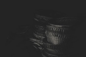 grayscale photography of wicker baskets