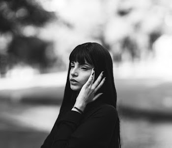 Grayscale Photography of Woman Facing to the Side